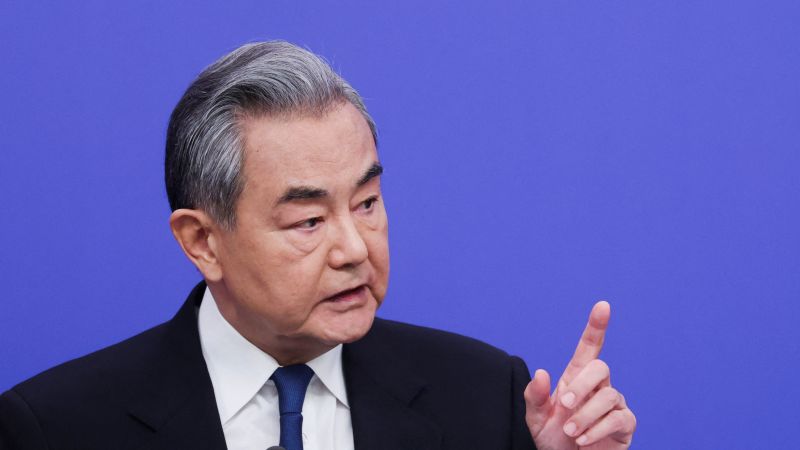 China’s Foreign Minister Wang Yi addressing press
